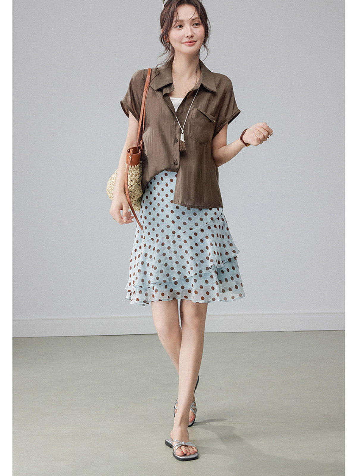 Light blue polka dot skirt with tiered ruffles and high waist.