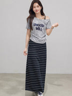 Navy blue and white striped midi skirt with side slit and drawstring waist.