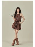 Brown A-line halter neck dress with gathered waist and flared hem.