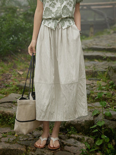 Beige A-line skirt with drawstring waist and side pockets