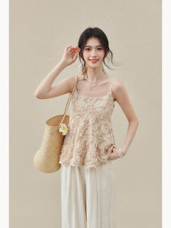 Beige tank top showing square neckline and floral appliqué