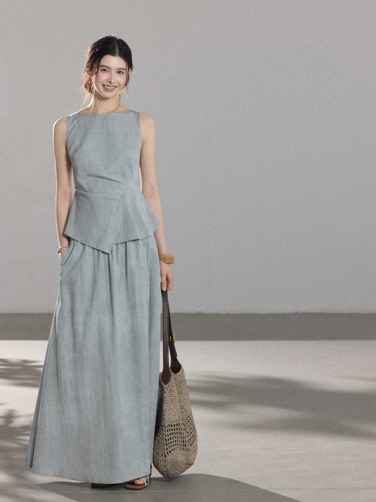 Light blue a-line pleated skirt with elastic waistband