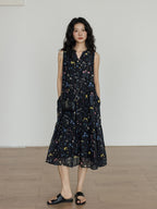 Black floral midi dress with tiered skirt and V-neck