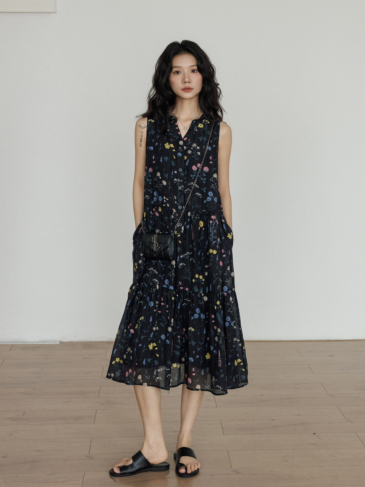 Black floral midi dress with tiered skirt and V-neck
