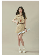 Beige mini A-line dress with short sleeves and collar.