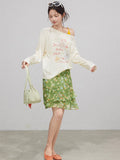 Layered green floral skirt with ruffled layers and high waist.
