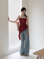 Red floral tank top featuring a square neckline and peplum waist.