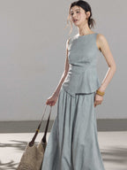 Light blue a-line pleated skirt from front view