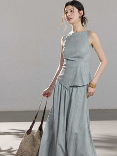Light blue a-line pleated skirt from front view