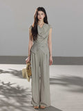 Full-length wide-leg pants in light grey with vertical stripes.