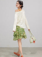 High waist green floral skirt with multiple ruffled layers.