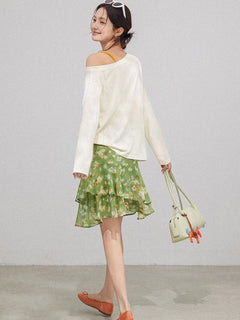 High waist green floral skirt with multiple ruffled layers.