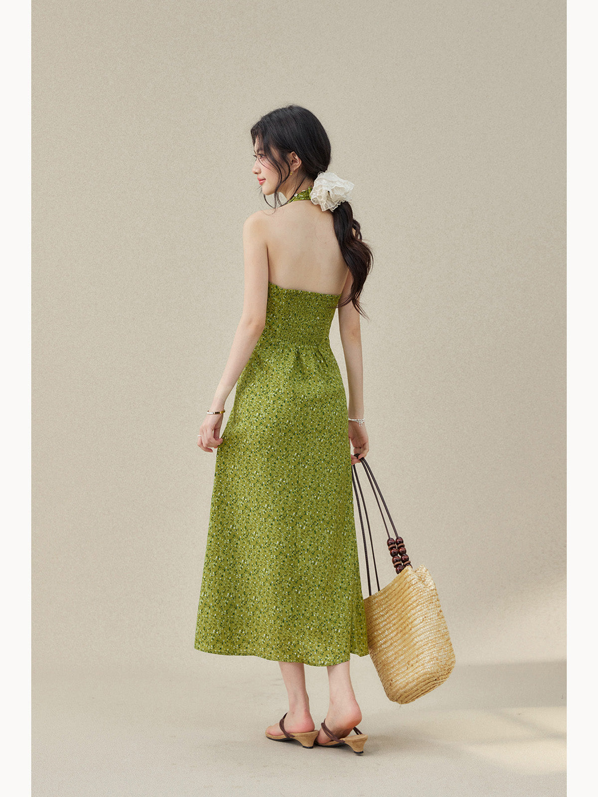 Ruffled neckline green dress with gathered bust detail.