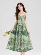 Front view of green floral midi dress with an embellished waistband.