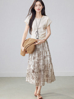 Elegant beige paisley a-line skirt with layered construction.