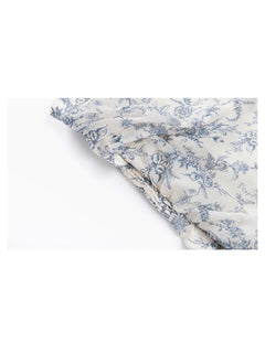 Smocked waist detail on blue floral camisole