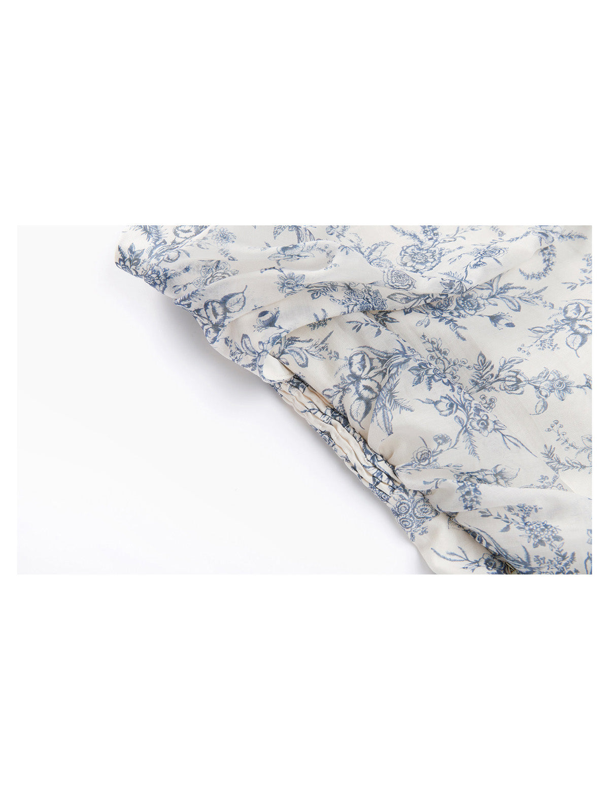 Smocked waist detail on blue floral camisole