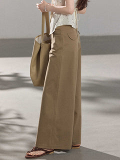 Full-length view of khaki wide-leg pants with straight hem and high-rise waist