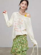 Green floral skirt with layered ruffles and a high waist design.