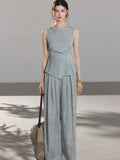 Light blue a-line pleated skirt from back view