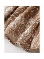 Brown paisley tiered skirt shown from side view