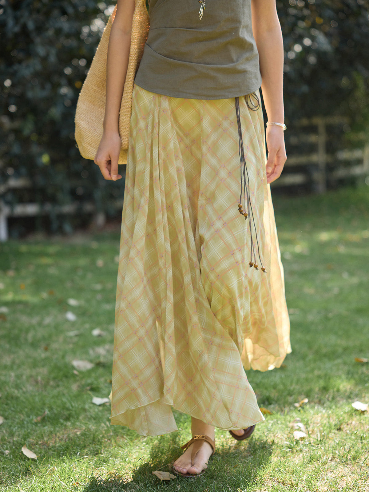 Yellow plaid long skirt with asymmetrical hem and gathered fabric