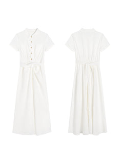 A white A-line dress with a button-front, collar, and twisted waist tie shown from the front and back.