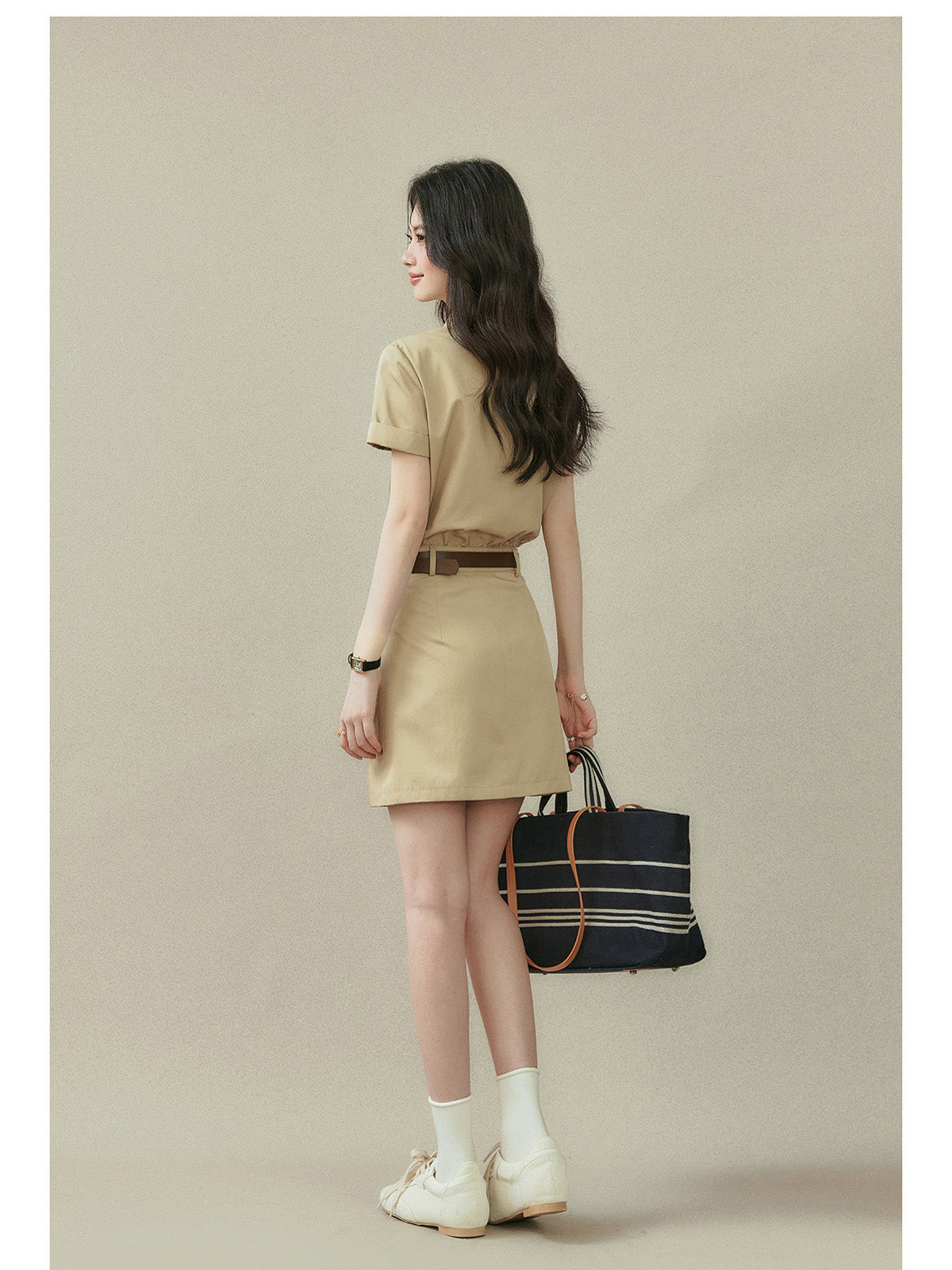 Beige short-sleeve dress with a straight hem and button placket.