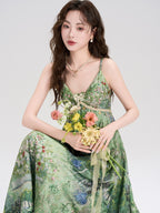 Side view of green floral dress showing gathered fabric at the waist.