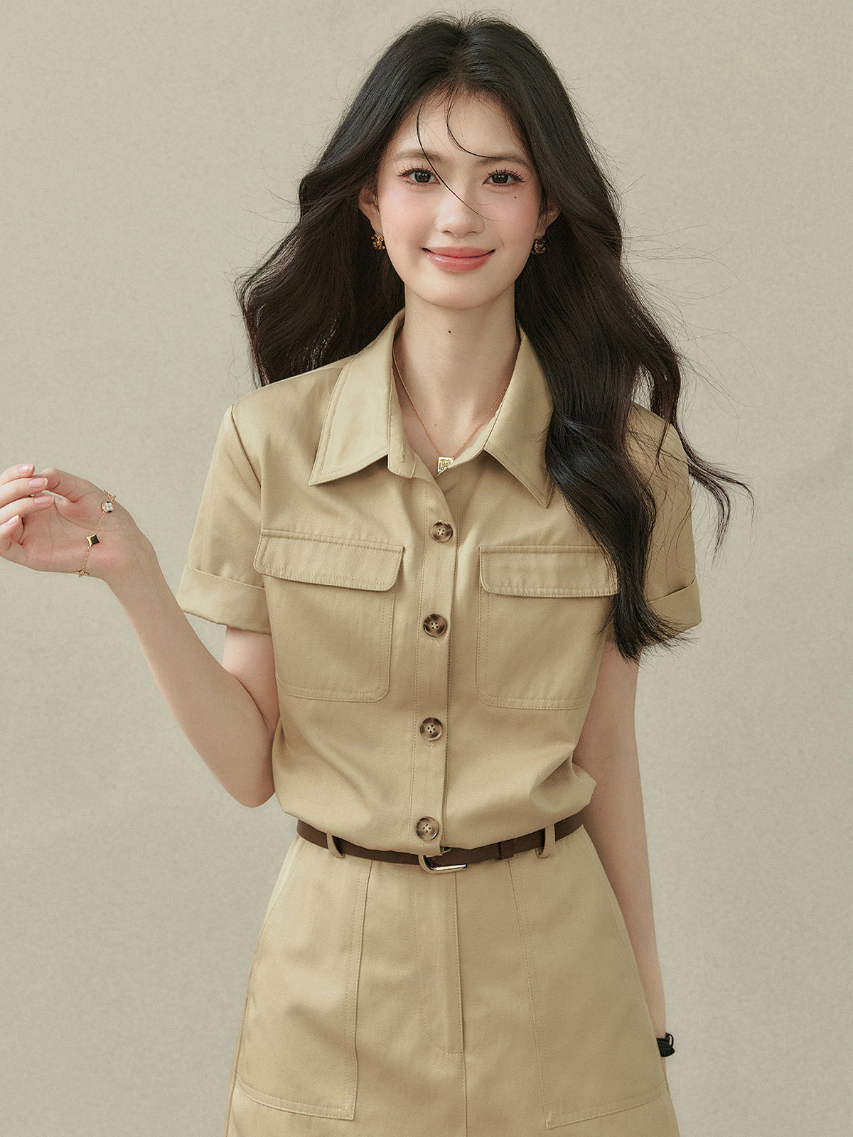 Beige A-line dress with collar, short sleeves, and two chest pockets.