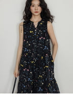 Black floral dress with tiered skirt and gathered waist detail