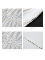 Close-up details of the ivory A-line long dress: elasticated waist, side pocket, and hem.