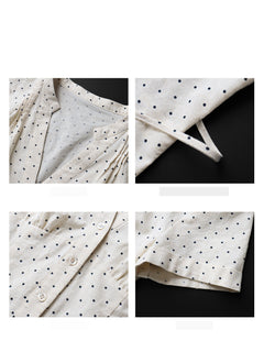 A close-up of the pleated neckline detail on a cream polka dot short-sleeve top.