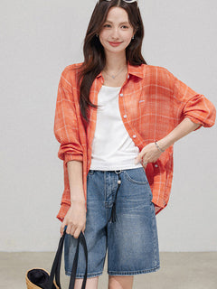 Light blue denim shorts worn with a relaxed fit.