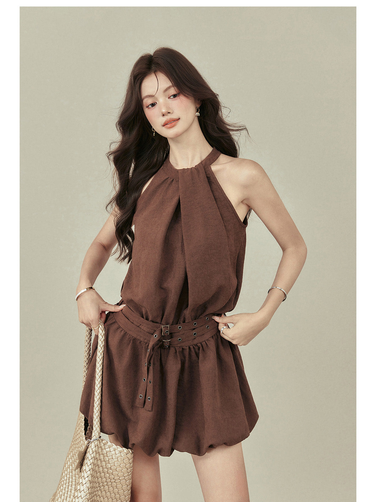 Side view of brown A-line dress showing flared hem and waist belt.