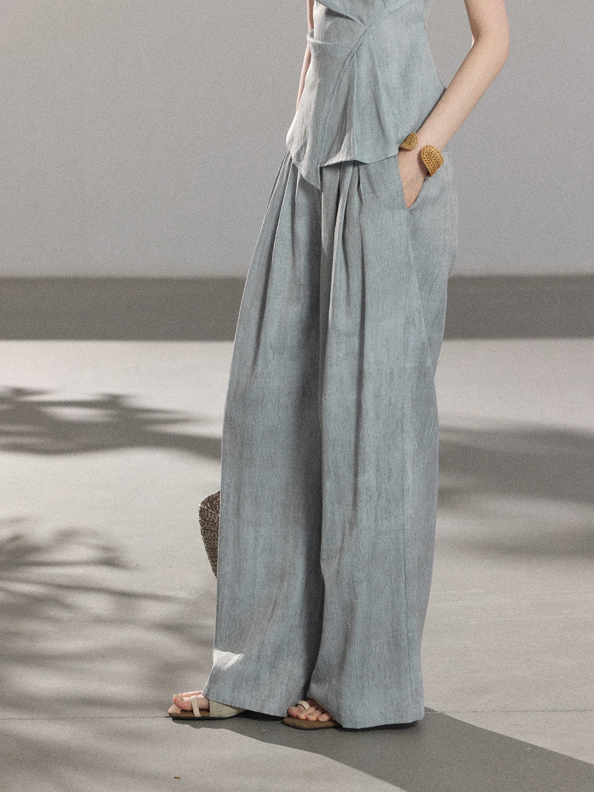 Light blue long pleated skirt with gathered waistband
