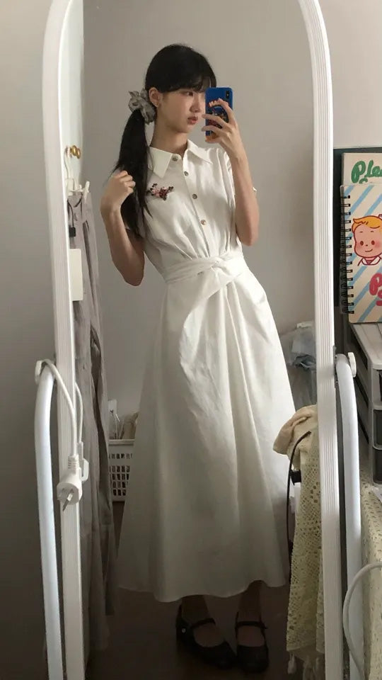 SHEVOV customer look featuring White A-line dress with button-front and pleated skirt