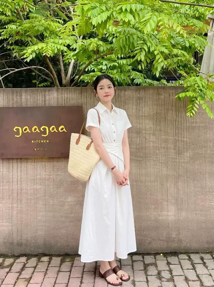 SHEVOV customer look featuring White A-line dress with button-front and pleated skirt