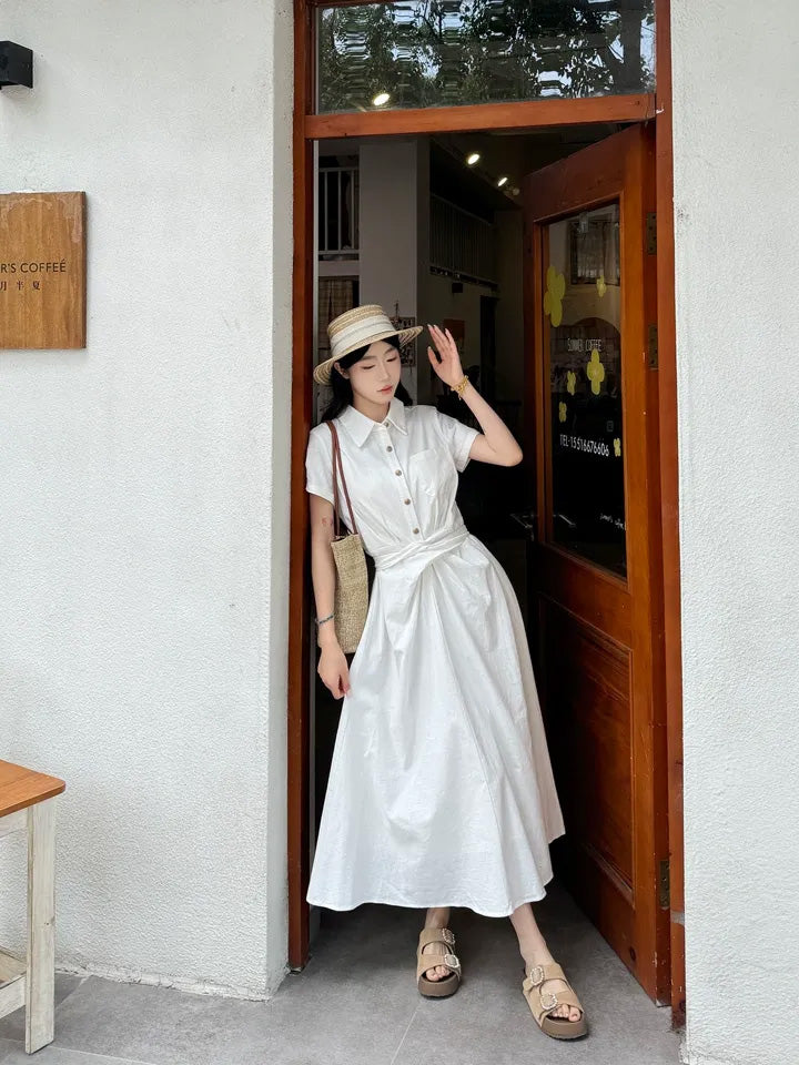 SHEVOV customer look featuring White A-line dress with button-front and pleated skirt