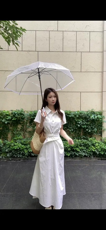 SHEVOV customer look featuring White A-line dress with button-front and pleated skirt